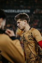 Opwarmingsshirt 25/26 Volw